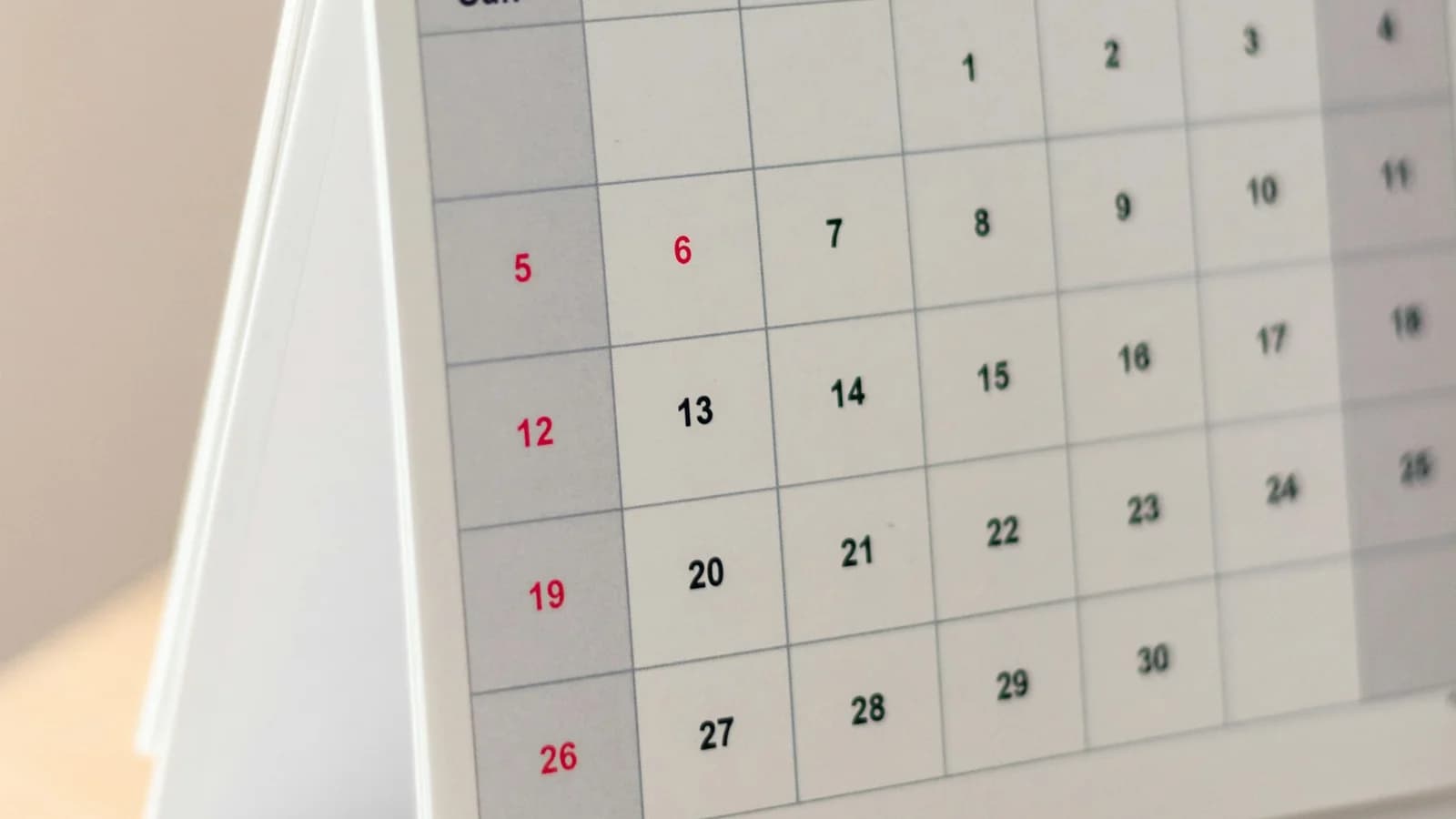 A close-up of a desk calendar date grid.